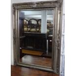 A modern silvered-framed wall mirror, W86cm, L117cm