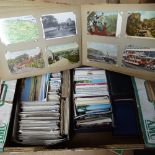 An album of topographical postcards, and 2 boxfuls of similar loose postcards