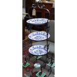 A wrought-iron 3-tier cake stand, including 3 blue and white bowls, H83cm