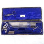 A leather-cased set of urology surgical instruments, by Millikin & Lawley of London, case length