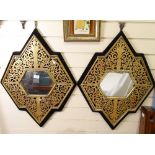 2 carved and pierced gilt-gesso framed hexagonal mirrors, on felt backing, overall height 73cm