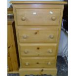 A modern narrow pine 4-drawer chest, W50cm