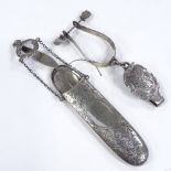 An Edwardian silver spectacles case with waist clip, all over engraved floral decoration, by