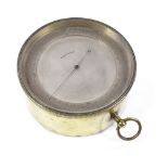 A Victorian brass drum-cased barometer with silvered dial, diameter 12cm, and an unusual Middle