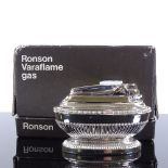 A Ronson Varaflame gas chrome table lighter, length 9cm, original box Very good original unusued