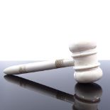 An ivory gavel, circa 1900, length 14cm A number of fine cracks to the head and the handle, no chips