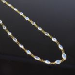 An unmarked gold moonstone line collar necklace, necklace length 46cm, 4.6g Very good original