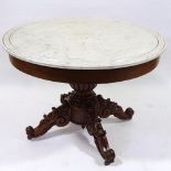 A French circular marble-topped centre table on carved mahogany base, 39" across