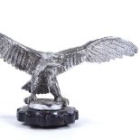A large chrome-plate bronze eagle design car mascot, early 20th century, on original Bakelite-