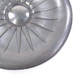Rene Delavan, large mid-20th century pewter charger, hand beaten with applied sun ray motif, cast