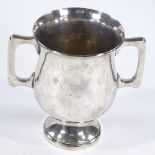A large George V silver 2-handled trophy, with fluted rim, by Jay, Richard Attenborough Co Ltd,