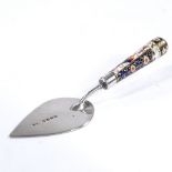 A Victorian small silver-bladed Crown Derby trowel, with hand painted and gilded porcelain handle,