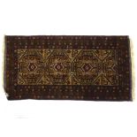 A Caucasian handmade geometric design wool rug