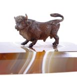 A cold painted bronze miniature bull on banded agate plinth, plinth length 7cm Perfect condition