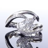 A platinum 0.9ct pear-cut diamond crossover ring, diamond set shoulders, central pear-cut diamond