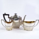 A George V silver 3-piece tea set, comprising teapot, large sugar bowl and cream jug, oval half-