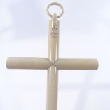 A large late 19th century French hollow ivory cross, dated 1891, length excluding loop 45cm There is