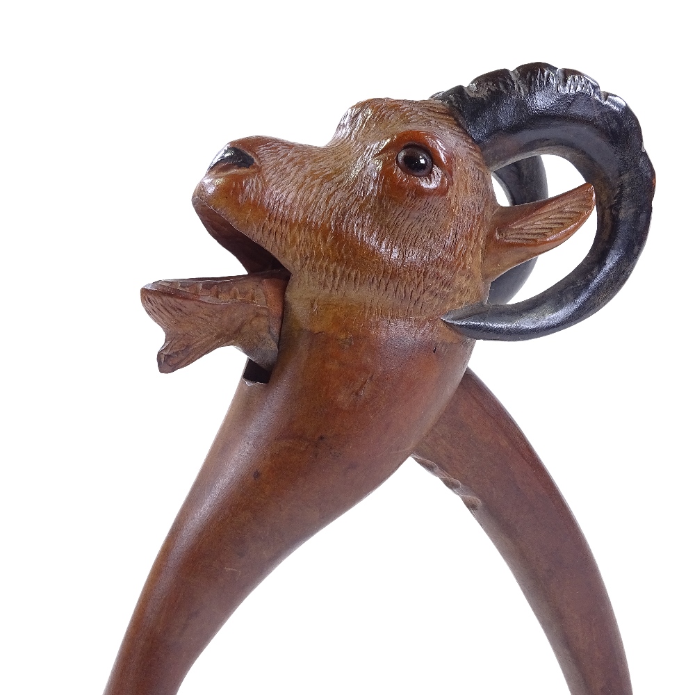 A Tyrolean carved wood ibex design nutcracker with glass eyes, length 21cm Perfect condition, no - Image 3 of 3