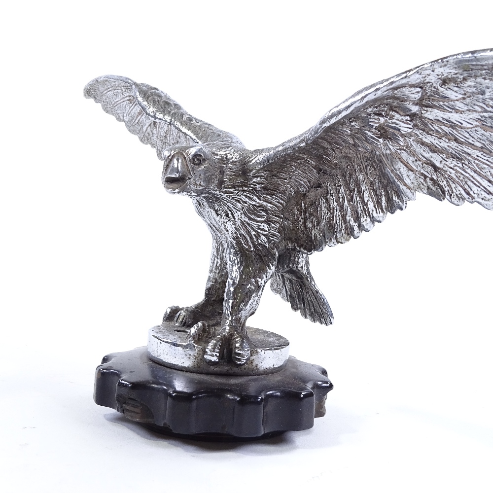 A large chrome-plate bronze eagle design car mascot, early 20th century, on original Bakelite- - Image 3 of 3