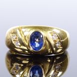 An 18ct gold sapphire and diamond gypsy ring, oval-cut sapphire approx 0.55ct, setting height 9.5mm,