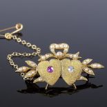 A Victorian 18ct gold ruby diamond and split-pearl double-heart brooch, with ribbon and leaf