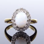 An 18ct gold opal and diamond cluster ring, total diamond content approx 0.14ct, maker's marks AL,