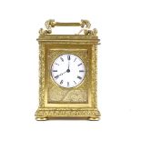 A fine quality 19th century gilt-bronze cased carriage clock, with relief cast columns, enamel