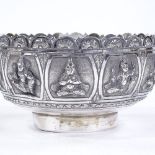 An unmarked Indian silver Thabeik bowl, high relief cast dancers, diameter 12cm, 5.7oz Good