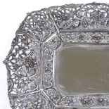 A German silver dish, pierced and relief embossed cherub and bird decoration, length 25cm, 7oz