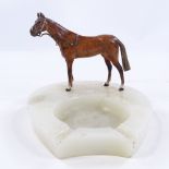 An Asprey cold painted bronze horse mounted on an onyx base Onyx base is stamped Asprey London,