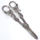 A pair of Elizabeth II silver grape scissors, fox and grapevine handles with serrated blade, by