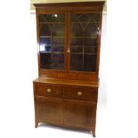 A George III plum pudding mahogany and satinwood banded secretaire bookcase, circa 1790, glazed