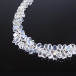 An unmarked silver graduated cabochon moonstone cluster grape design necklace, necklace length 50cm,