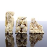 3 Japanese carved ivory netsuke, Meiji Period, comprising a group of fruit with snail, height 3.5cm,