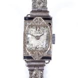VULCAN - a lady's Art Deco platinum diamond sapphire and onyx mechanical cocktail wristwatch,