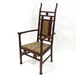 An Arts and Crafts high-back armchair by William Lethaby, with inlaid decoration