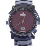 JUNGHANS - a black ceramic Mega Solar quartz wristwatch, solar panel dial with ceramic bezel and