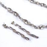 A modern sterling silver twist necklace and drop earring set, by Michael Burton, hallmarks London