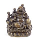 A Chinese bronze seated Buddha, height 14cm