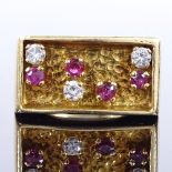 A 1970s 18ct gold ruby and diamond panel ring, textured finish, maker's marks H&M, hallmarks