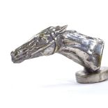 A silver patinated bronze racehorse design car mascot, mid-20th century, length 10.5cm Silver