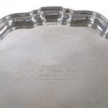 A George V circular silver salver, scalloped rim, by Charles S Green & Co Ltd, hallmarks
