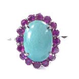 An unmarked white metal turquoise and ruby cluster ring, setting height 16.6mm, size N, 4.5g Very