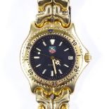 TAG HEUER - a gold plated stainless steel mid-size 200M quartz wristwatch, ref. S94.706M, black dial