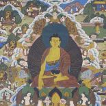 An Oriental watercolour thangka on linen, depicting a seated Buddha, in green silk surround with