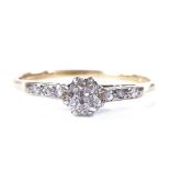 An 18ct gold solitaire diamond ring, diamond set shoulders, total diamond content approx 0.4ct,