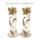 A pair of Art Nouveau hand blown glass vases, with hand painted gilded poppy designs, circa 1900,