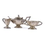 A George V miniature 3-piece silver teaset, comprising teapot, sugar bowl and cream jug, by Levi &