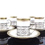 A set of Wedgwood gilt-edge coffee cans and saucers in pierced silver holders, hallmarks 1916