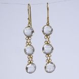 A pair of unmarked gold 3-stone cabochon moonstone drop earrings, shepherd hook fittings, height